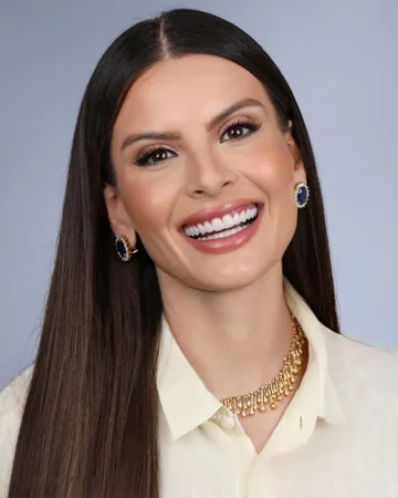 Sorriso de paciente da Clínica Viotto