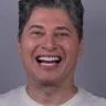 Sorriso de paciente da Clínica Viotto